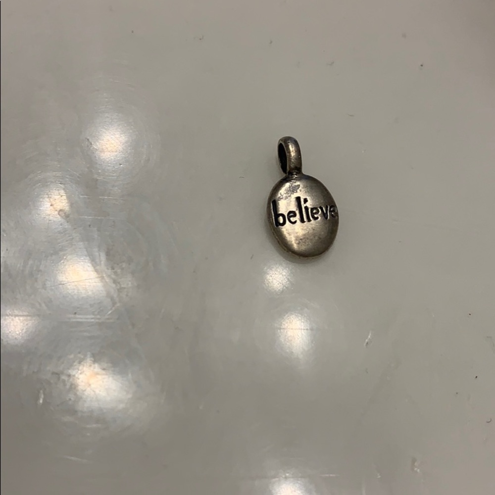 Sterling silver believe charm